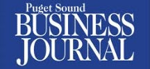 Puget Sound Business Journal Logo in white text on dark blue background